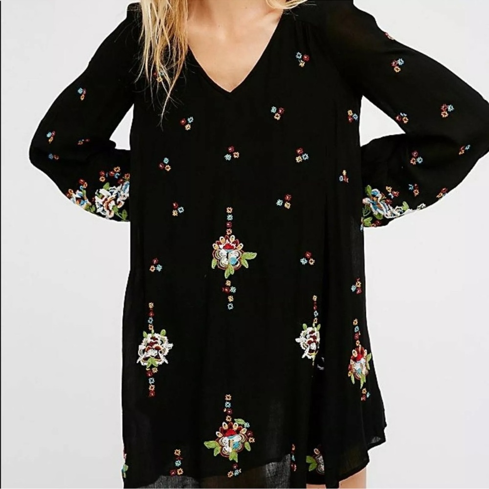 Black V-neck Tunic with Long Bell Sleeves and Relaxed Embellished Style